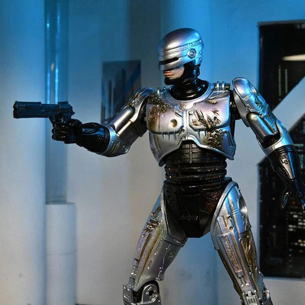 RoboCop: Battle Damaged RoboCop with Chair - Ultimate Actionfigur - 18 cm