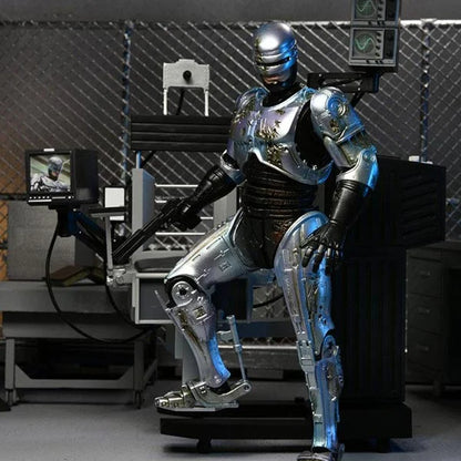 RoboCop: Battle Damaged RoboCop with Chair - Ultimate Actionfigur - 18 cm