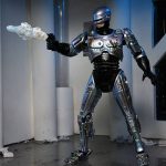 RoboCop: Battle Damaged RoboCop with Chair - Ultimate Actionfigur - 18 cm