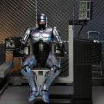 RoboCop: Battle Damaged RoboCop with Chair - Ultimate Actionfigur - 18 cm