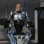 RoboCop: Battle Damaged RoboCop with Chair - Ultimate Actionfigur - 18 cm